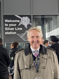 Jeff Fairfield, Executive Director of RHLCT, awaits his ride on the Silver Line.